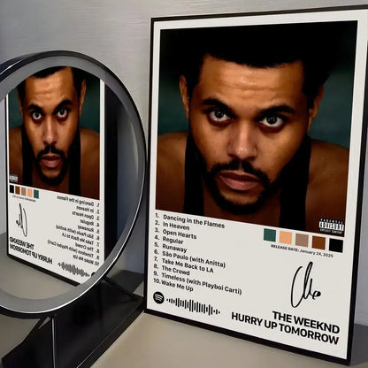 Black-framed rectangular poster featuring the weeknd album hurry up tomorrow with modern graphic and signature for wall decor