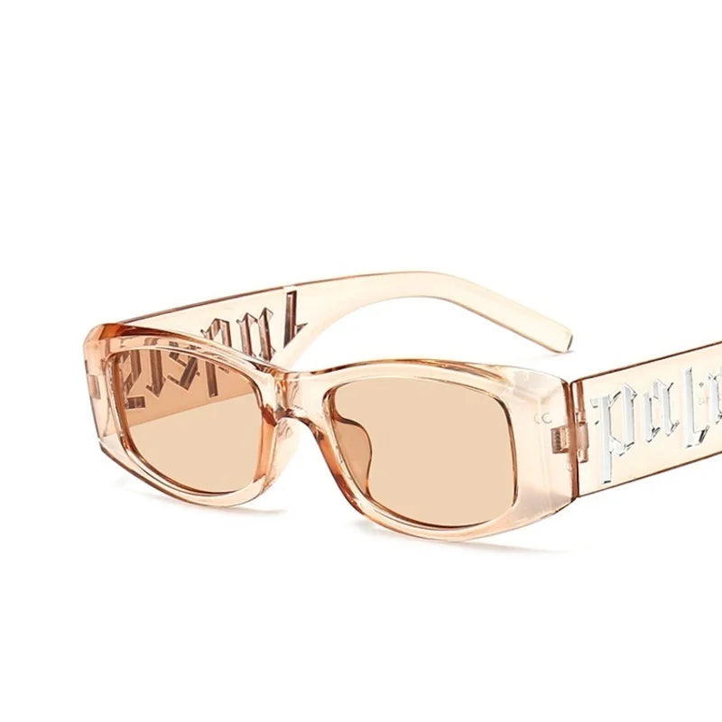 Transparent peach-colored rectangular fashion sunglasses designer with etched lettering on frames brand unisex glasses