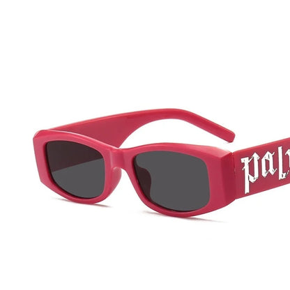 Vibrant pink fashion sunglasses designer with dark gray lenses and bold white pal logo on designer square brand temple