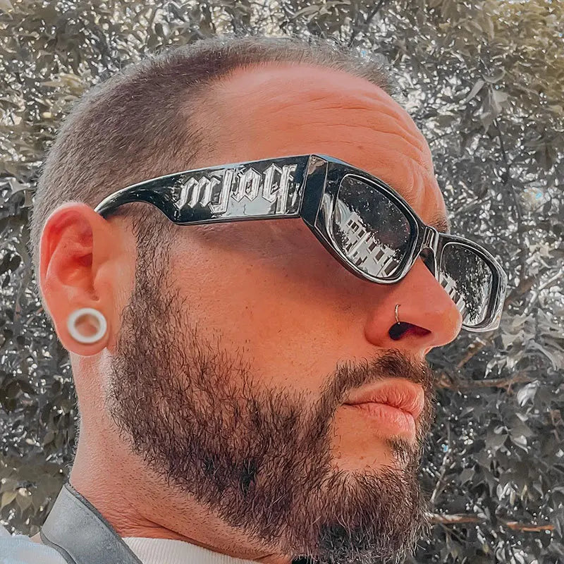 Black-framed fashion sunglasses designer with glossy finish and silver lettering on temples from designer square brand unisex glasses