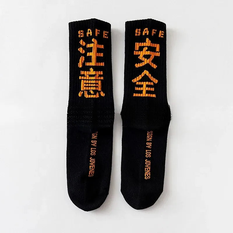 Black tactical socks streetwear with orange embroidered safe kanji text made of quality cotton harajuku for casual skateboard use