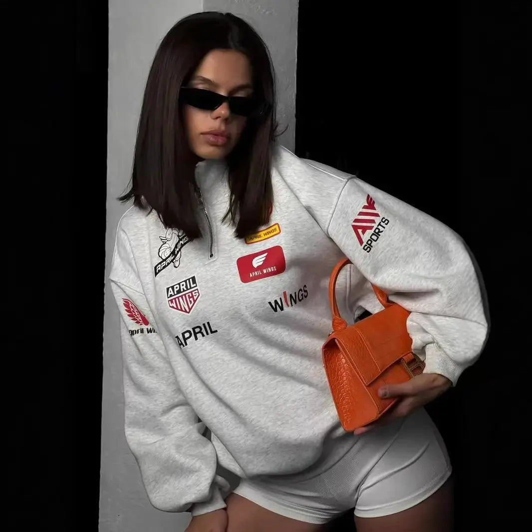 Orange textured mini handbag featured with hip hop sports racing half zipper casual hoodies clothes for autumn 2026