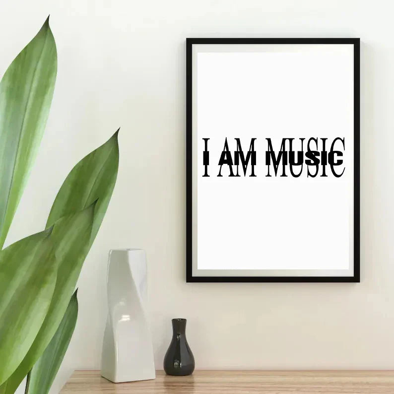 Black-framed wall art with bold black serif text i am music on white background hip hop star rapper playboi carti album cover poster