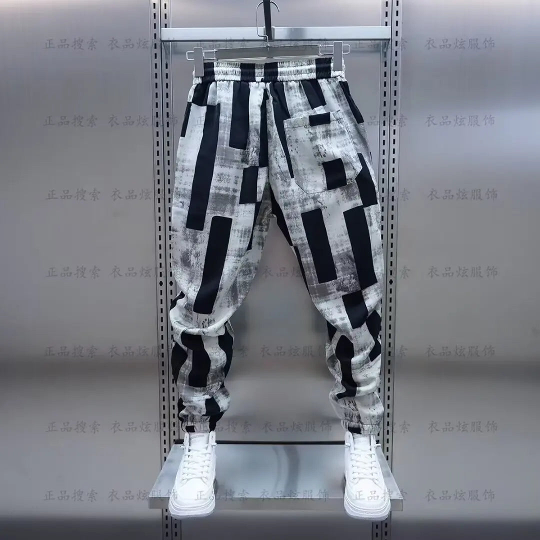 Black and white geometric-patterned wide-leg jogger sweatpant luxury for men clothing streetwear casual pants with sneakers