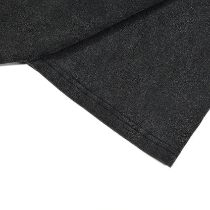 Dark heather gray cotton fabric with soft textured weave and stitched hem in hip hop streetwear oversized t shirt