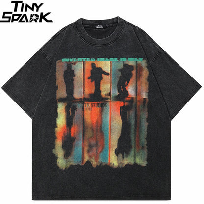 Black cotton hip hop streetwear t-shirt with faded abstract silhouettes and vibrant orange teal yellow gradients