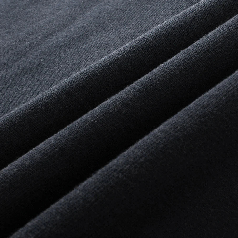 Dark gray knit fabric with soft texture and subtle ribbed pattern in hip hop streetwear oversized cotton t shirt