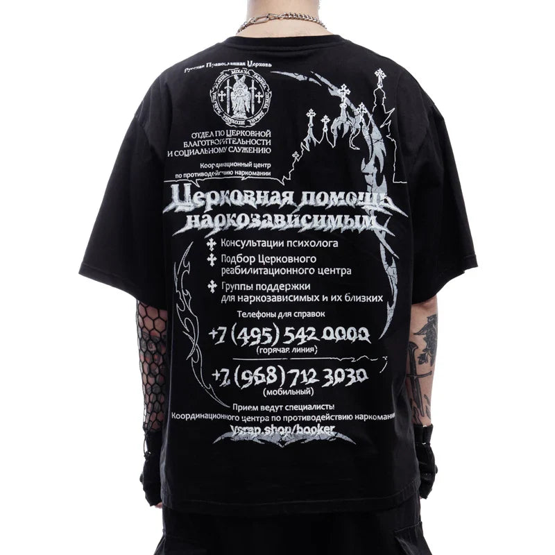 Black short-sleeved cotton t-shirt with white cyrillic graphic print featuring crosses and ornate designs for streetwear