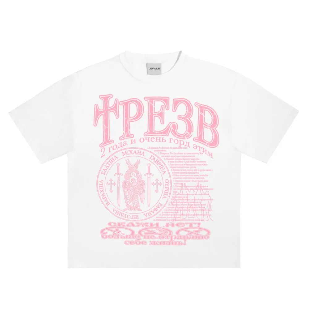 White cotton hip hop streetwear t shirt with pink graphic print y2k featuring cyrillic text and circular emblem design
