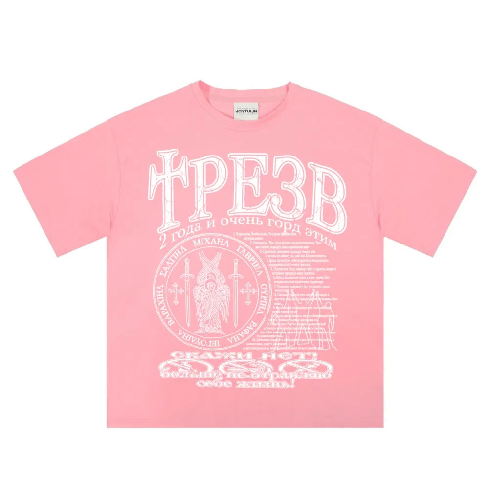 Pink cotton hip hop streetwear t shirt with white graphic print y2k featuring cyrillic text and circular emblem design