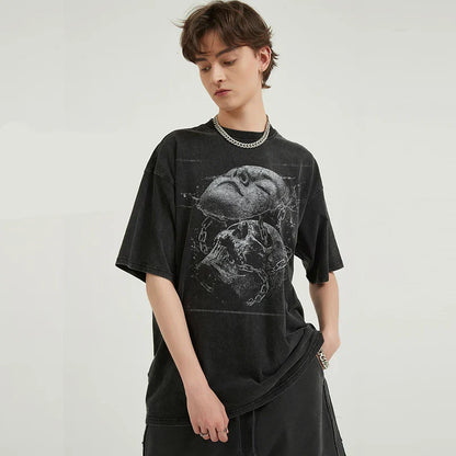 Black oversized cotton tshirt harajuku with cracked face skull graphic featuring two skulls entwined with chains hip hop streetwear