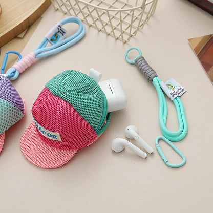 Pastel-colored mesh baseball cap earbud case with white logo patch and carabiner strap for men and women