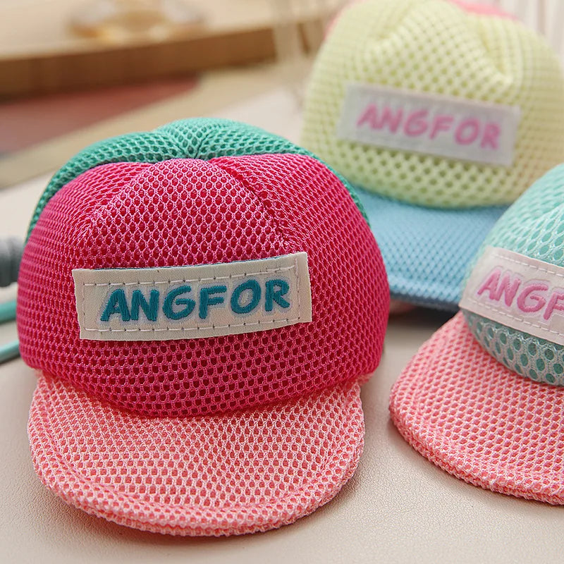 Pink mesh baseball cap mini bag with white label and teal angfor logo for multi-use key earphone pouch coin purse