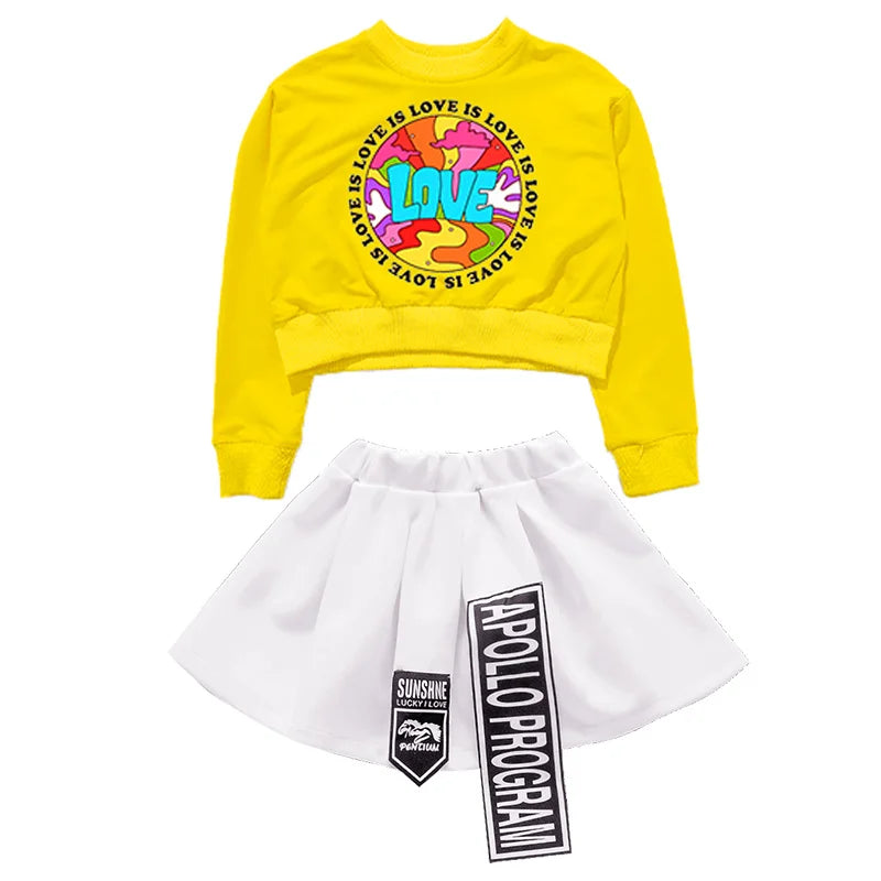 Vibrant yellow cropped sweatshirt with colorful love is love graphic in hip hop kids clothing set for dance performance