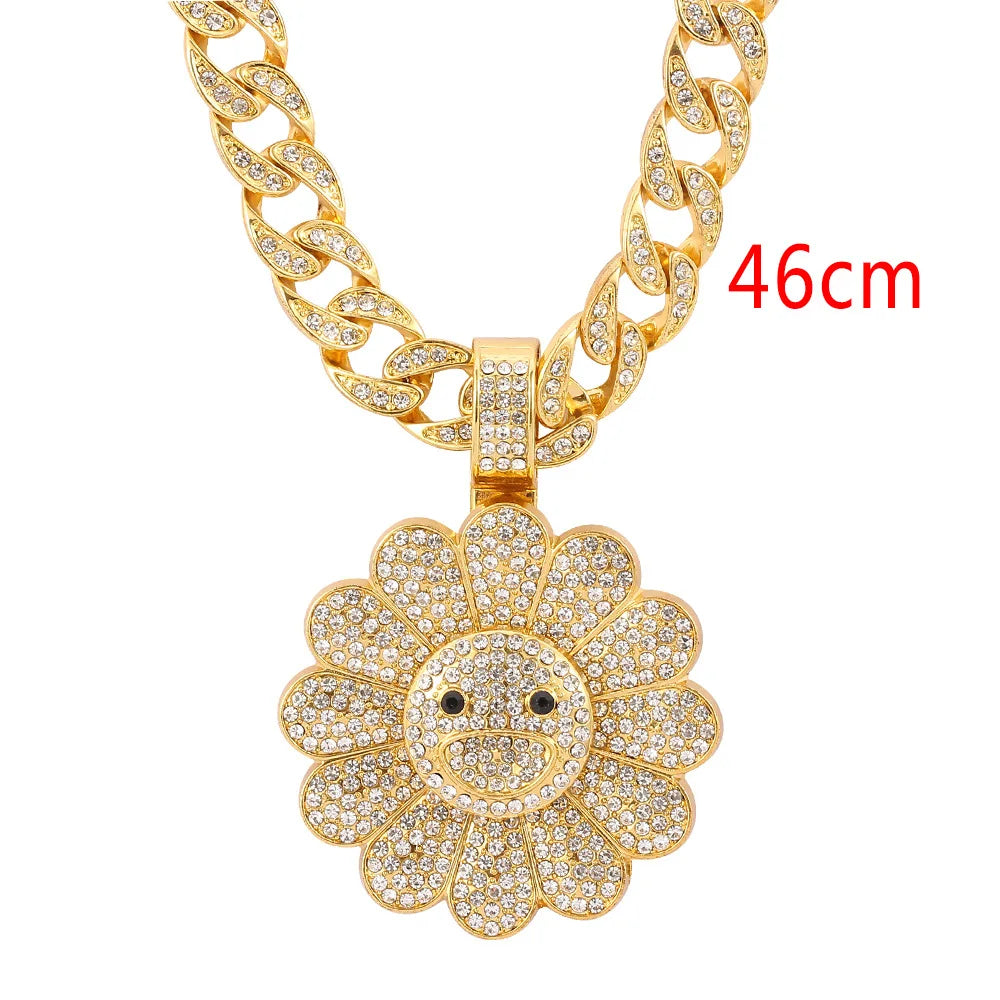Gold-colored copper takahashi sunflower pendant necklace with clear zirconia crystals and black bead eyes in a trendy brand style
