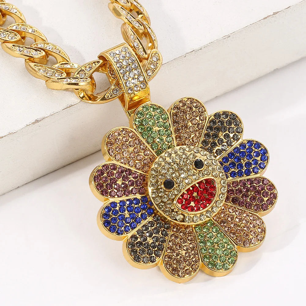 A vibrant rainbow-colored hip-hop style takahashi sunflower pendant with zirconia and gold on a trendy brand necklace