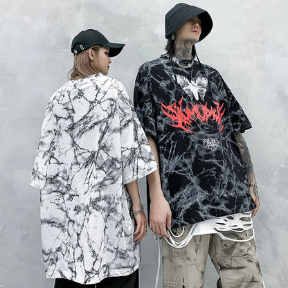 Black and white marble patterned oversized cotton t shirt with a bold red flame graphic for hip hop streetwear