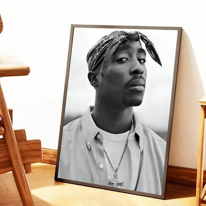 Black and white framed poster of tupac shakur wearing a bandana and cross necklace for home decoration gift