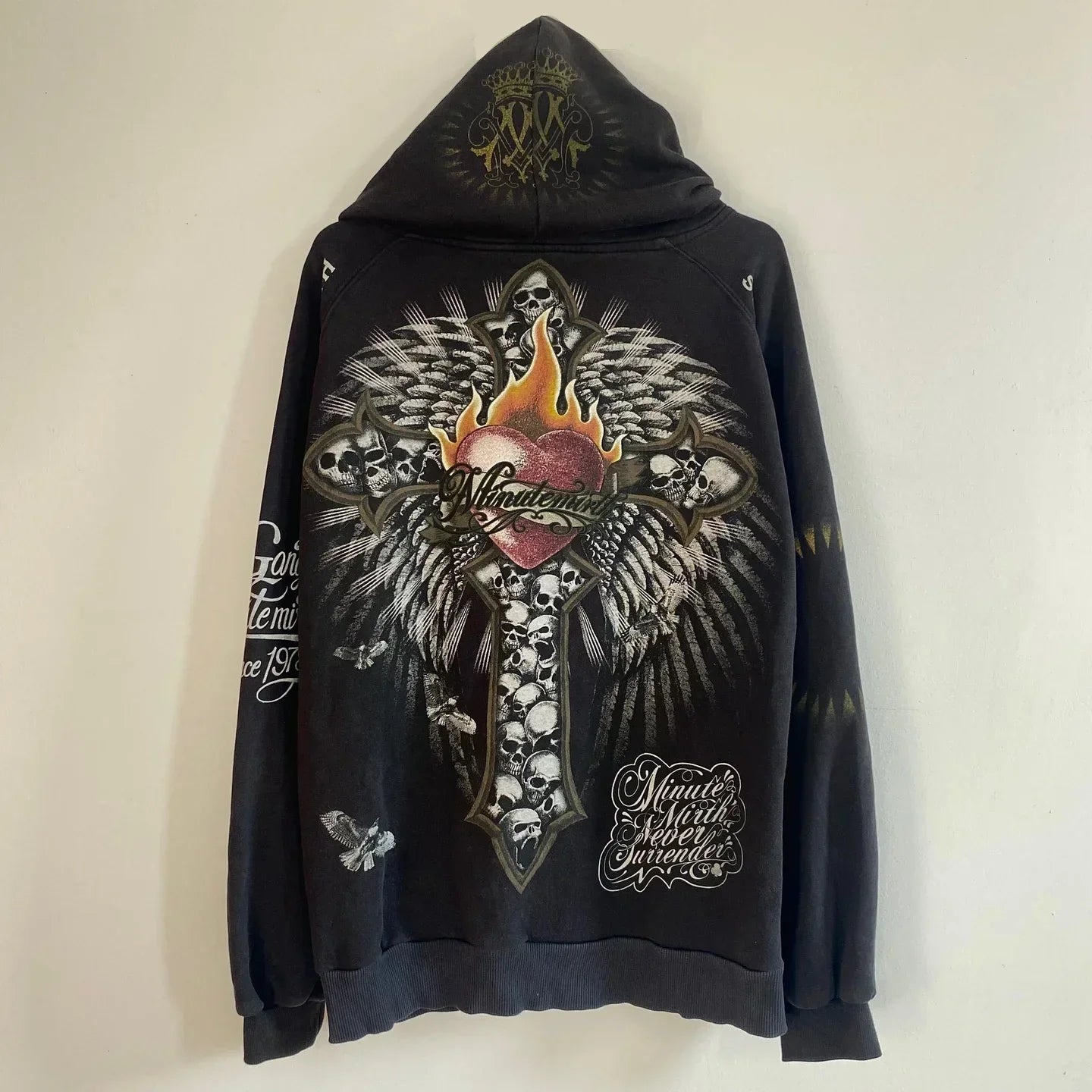 Black tapout zipper hoodie with flaming heart skull wings graphic and minute maid branding for women clothes y2k and jacket streetwear men