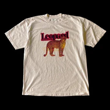 Off-white cotton t-shirt with bold orange and brown leopard graphic and red leopard text in hip hop trend high quality y2k style