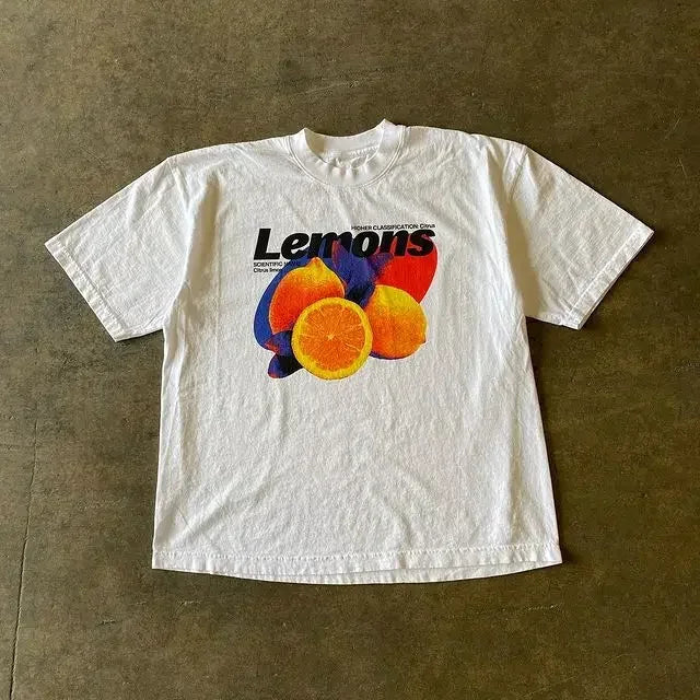 White cotton t-shirt with vibrant lemon and orange graphic and lemons text featuring cool design sense hip hop trend high quality y2k