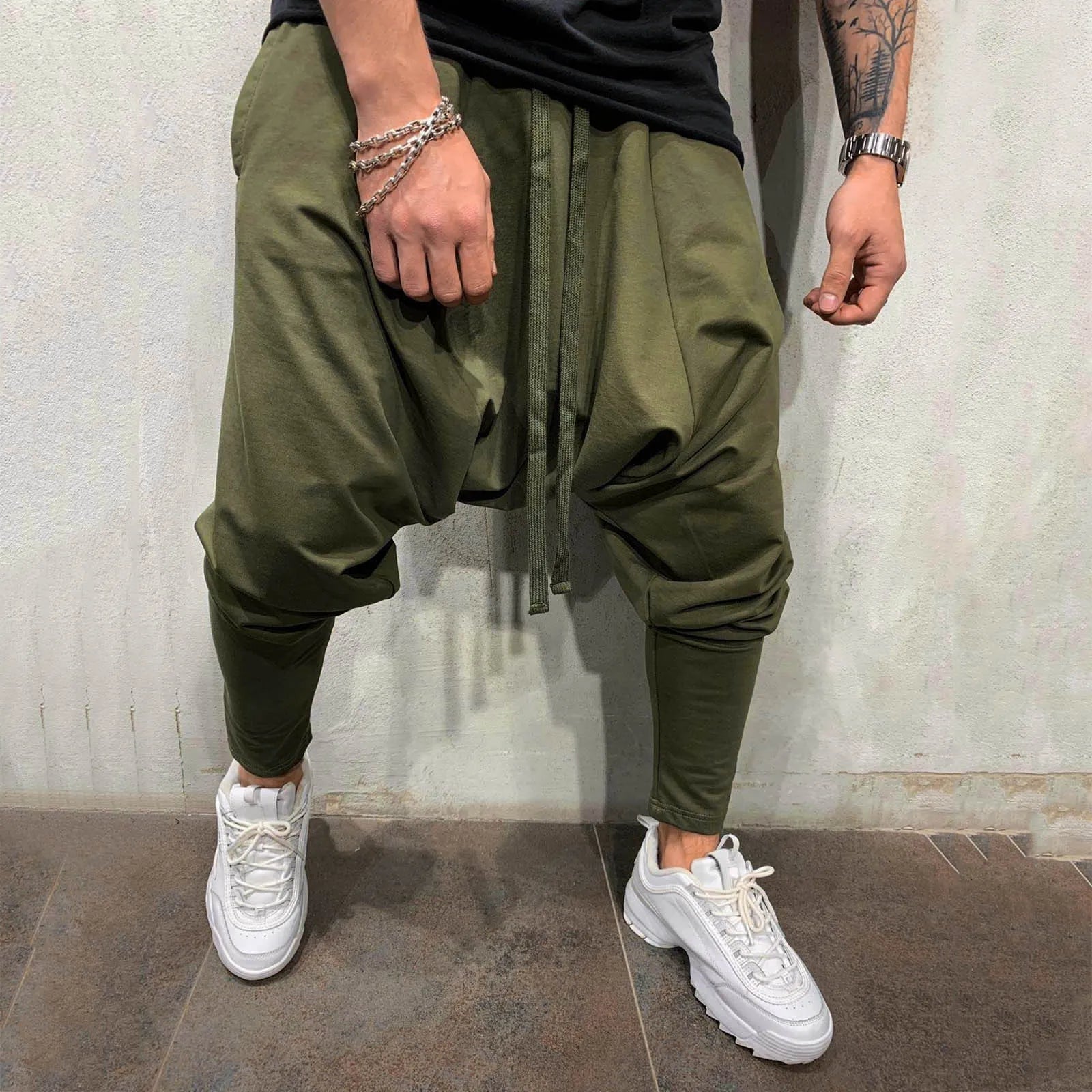Olive green hip hop trend loose solid drawstring harem pants with tapered legs for street sports and casual wear