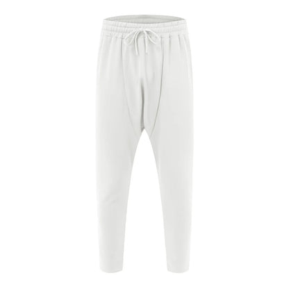 White drawstring joggers with sleek tapered fit and soft fabric for hip hop trend loose solid streetwear style