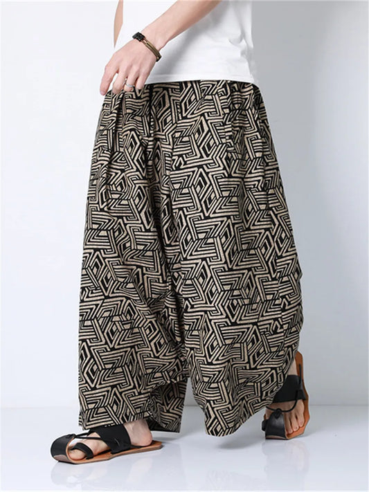 Black and white geometric patterned men harem pants featuring retro printed joggers design for hip hop trend streetwear