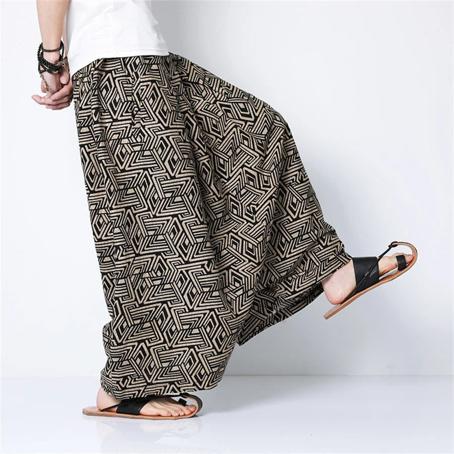 Black and beige geometric patterned men harem pants designed as retro printed joggers for hip hop trend streetwear