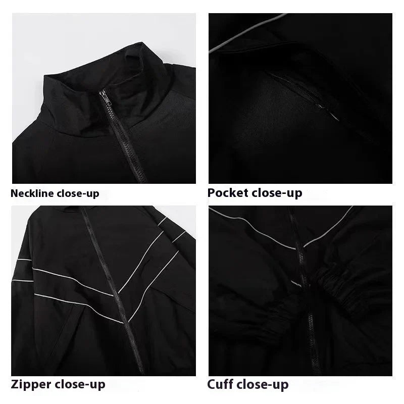 Black zip-up hip hop varsity jacket with white contrast stitching and high collar in high street patchwork style windbreaker coats