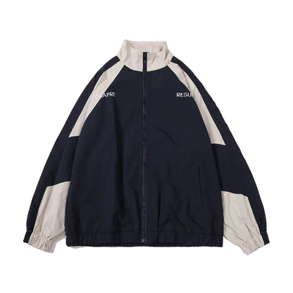 Navy blue and beige color-blocked hip hop varsity jacket with full zipper elastic cuffs and subtle white lettering on chest