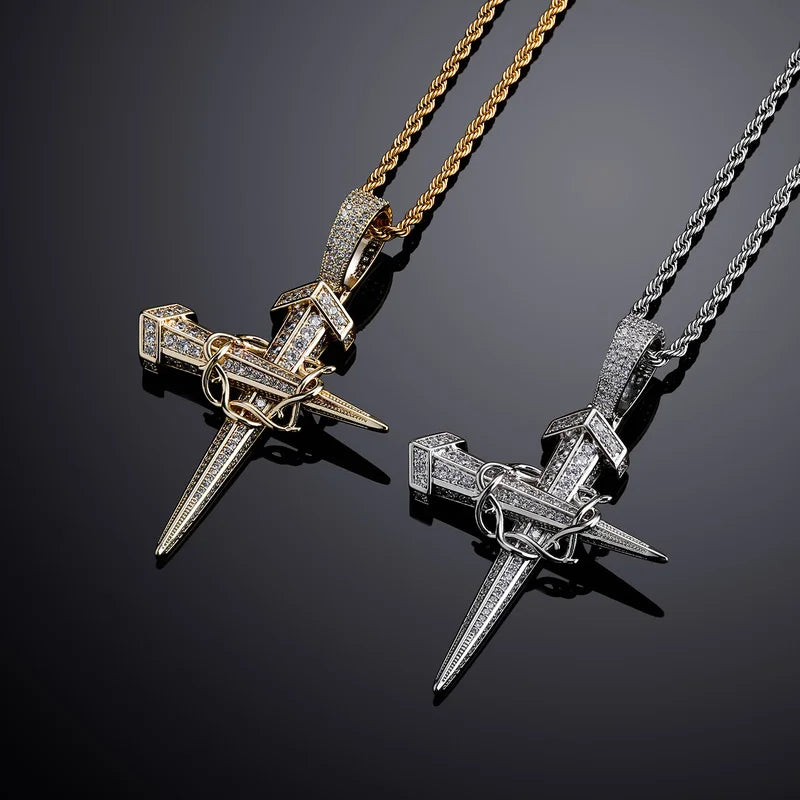 Two diamond-encrusted vintage winding nail cross pendants in gold and silver tones on twisted rope chains for rapper jewelry gifts