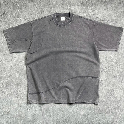 Dark gray oversized cotton sleeve tee with hip hop wax printing and quality raw edges featuring curved seam details