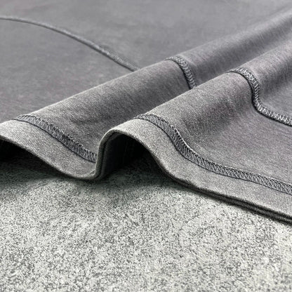 A soft heather gray cotton hip hop wax sleeve tee oversized with quality raw edges and neatly stitched seams