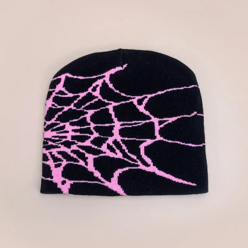 Black wool knit beanie with a bold pink spiderweb pattern for hip hop gothic retro street autumn and winter wear