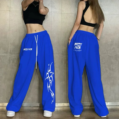 Bright blue cotton hip hop women casual dance sweatpants with white drawstrings and tribal design for spring autumn streetwear