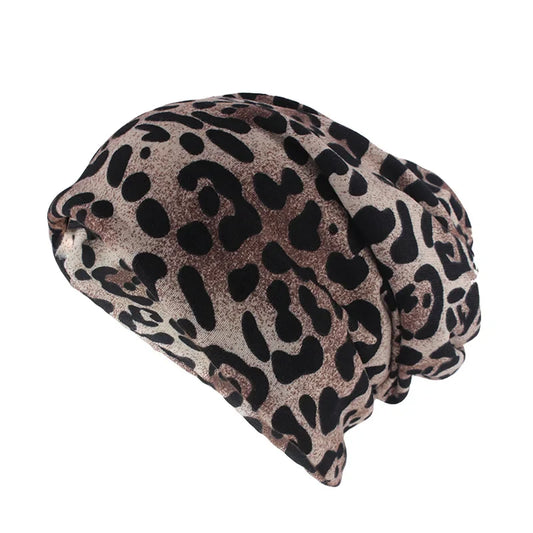 A soft slouchy women fashion leopard print autumn cotton beanie with black spots on beige and taupe base for hip hop women