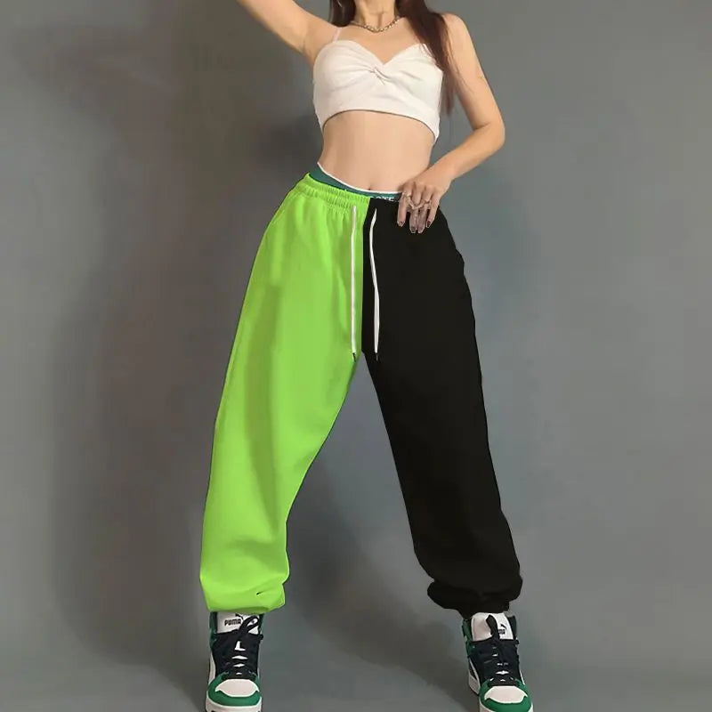 Bright neon green and black hop women streetwear split-leg joggers with white drawstring and pockets cotton loose fit