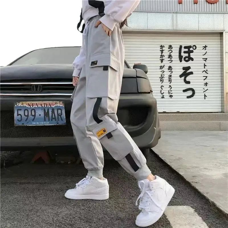 Light gray casual korean harem cargo pants with multiple pockets trousers black joggers featuring elastic cuffs and relaxed fit