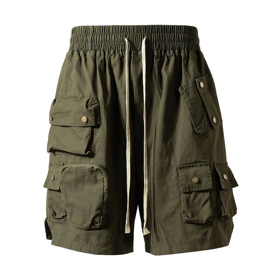 Olive green hip hop y2k streetwear cargo shorts with multiple pockets button closures and drawstring waistband