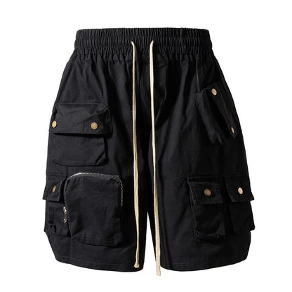 Black cargo shorts with multiple pockets brass-toned buttons and beige drawstring for hip hop y2k streetwear fashion