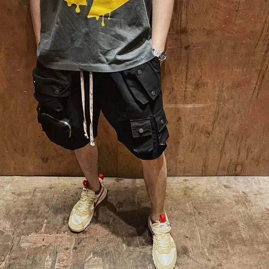 Black hip hop y2k streetwear cargo shorts with multiple pockets and white drawstrings for tactical fashion man use