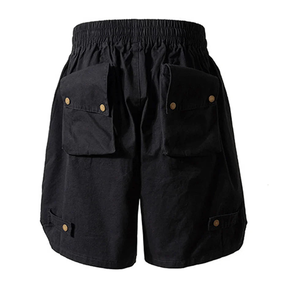 Black hip hop y2k streetwear cargo shorts with drawstring waistband and multiple pockets secured by brass buttons