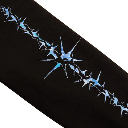 Black fabric sleeve of hip hop zipper men hoodie featuring a striking blue and white thorn pattern winter streetwear jacket