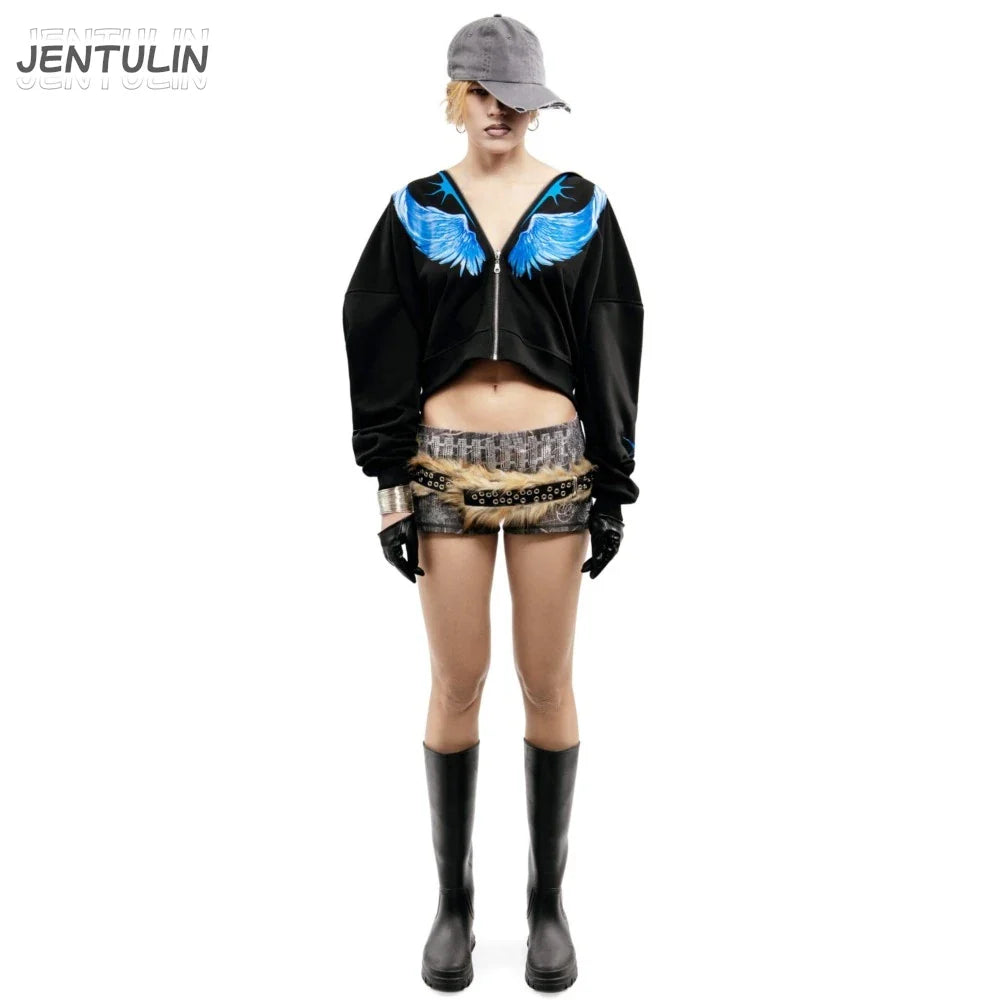 Black zip-up hoodie with vibrant blue wing embroidery across shoulders for winter streetwear and goth fashion