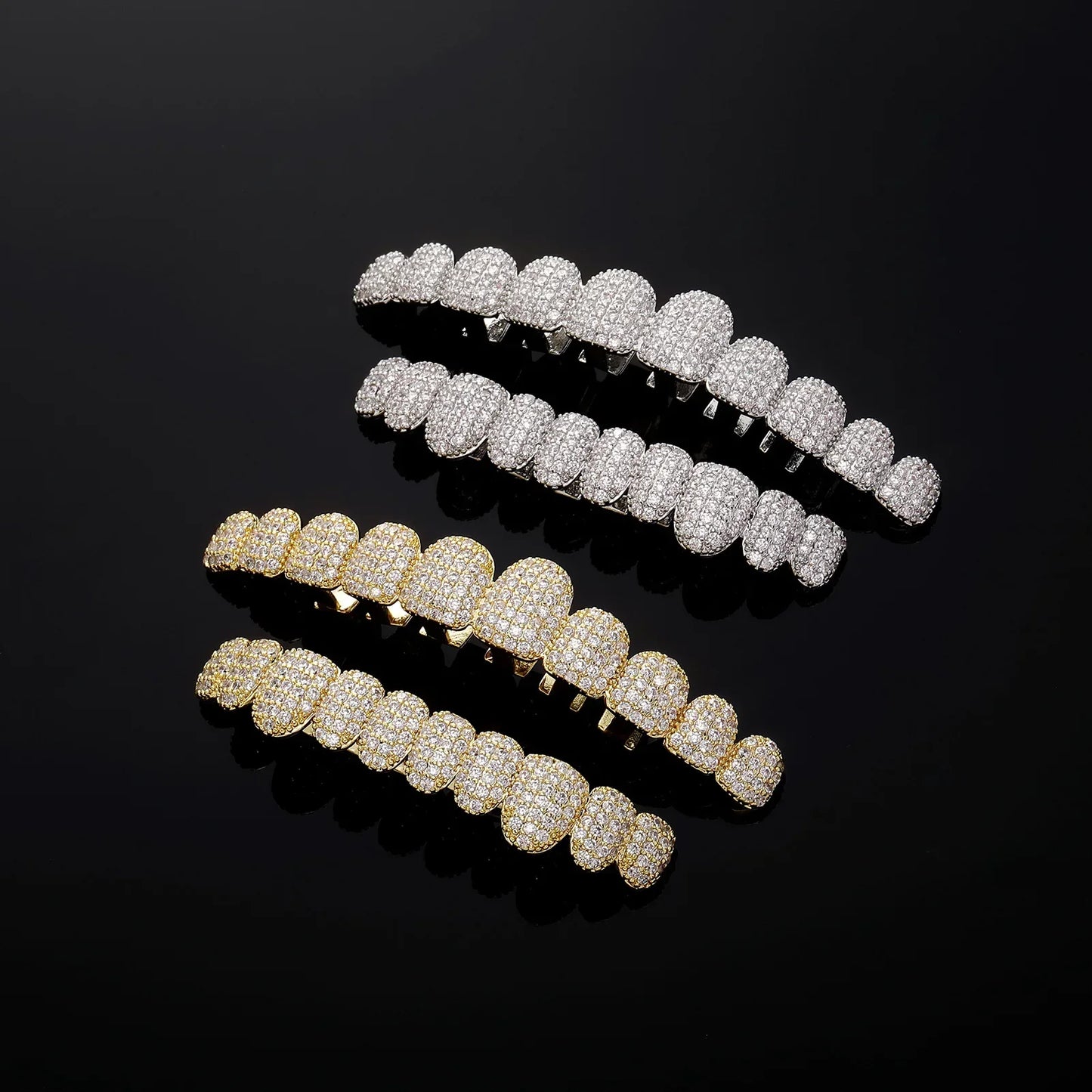 Three sets of silver and gold rapper 14k gold plated zircon tooth caps with intricate stones teeth grillz detailing
