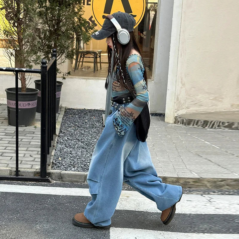 Blue denim overalls with distressed wide-leg cut and stitching details for hiphop fashion style girl y2k performance costume stage
