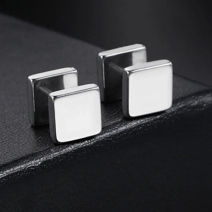 Silver square cufflinks with polished reflective surface and clean edges matching hiphop simple style geometry stud earings
