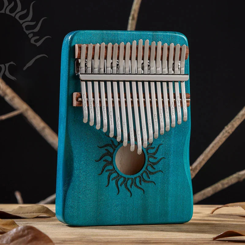 Teal wooden hluru 17 21 keys kalimba finger piano with silver metal tines and sun motif musical instrument mbira