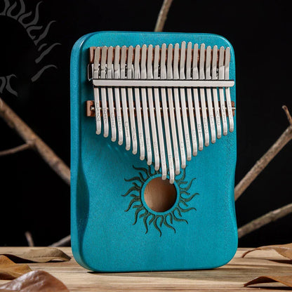 Turquoise hluru kalimba finger piano with silver tines and sun motif musical instrument mbira for beginner music lovers